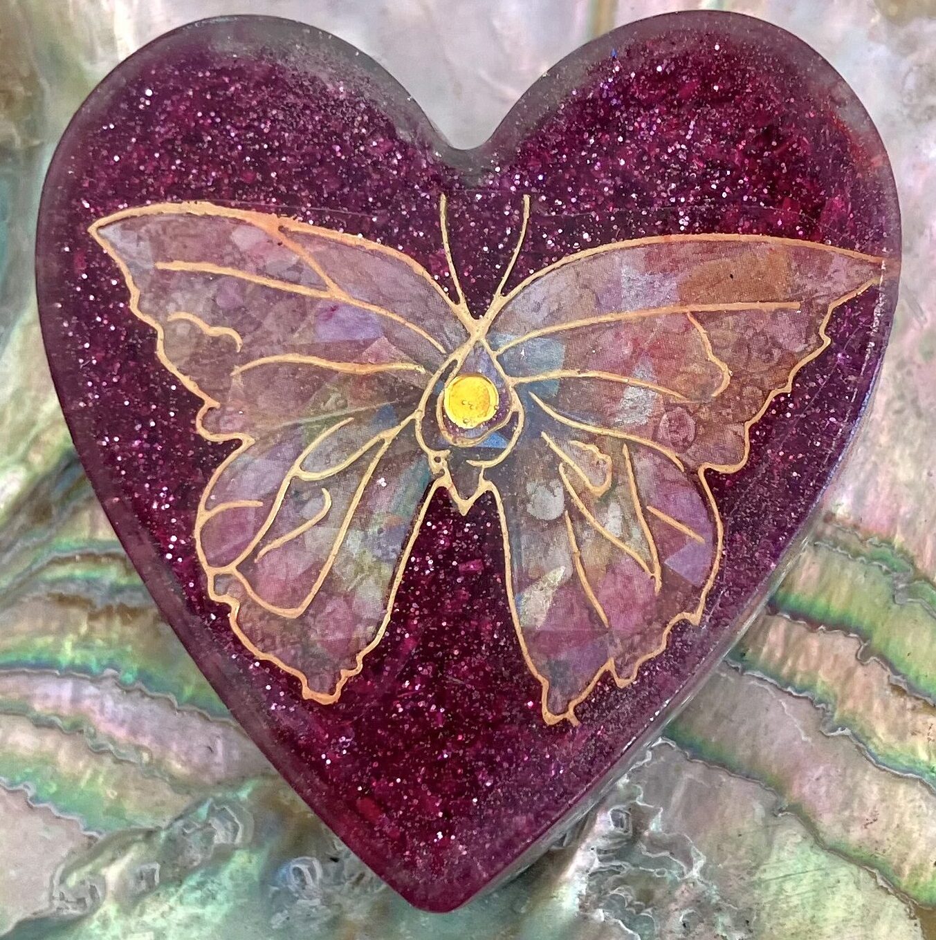 Divine Kauai Beautiful Orgonite Orgone hearts Beautiful Powerful Exquisite Orgonite Orgone Hearts are meticulously handcrafted with Hawaiian botanicals, Double-terminated crystals and lovely gemstones: Amethyst, Rose Quartz, Lapis Lazuli, Peridot, Aquamarine, Malachite and Howlite. Dr. Wilhelm Reich 50/50 ratio of resin to metal making it powerful orgonite. Orgonite transmutes the electromagnetic vibrations of modern technology into a frequency compatible with human well-being. Orgonite assists in balancing all of our bodies and fields to bring us into natural states of harmony and re-establishing energy flow in our body meridian system. Orgone, Orgonite for children, kids, gifts, Valentine's day, mother's day, father's day, birthdays, holidays, baby gifts, pets, all occasion. Orgonite devices transform the environment into a life-affirming atmosphere. transmutes EMR and ELF radiation from microwaves, Smart meters, computers, hand-held devices, Wi-Fi, Bluetooth, etc. Orgonite works perpetually & functions as a self-generating transmutation device. It never expires! Orgonite Orgone jewelry, necklaces, amulets. Meditation. Orgonites Orgone Orgonite cell phone shields. Orgone Orgonite Orgone Tablet shields. Orgonite Orgone monitor shields. Orgonite Orgone meditation. wifi protection Orgonite Orgone. Orgonite Orgone for sleep, healing, relaxation. Orgonite Orgone microwave shields. Orgonite Orgone appliance shields.