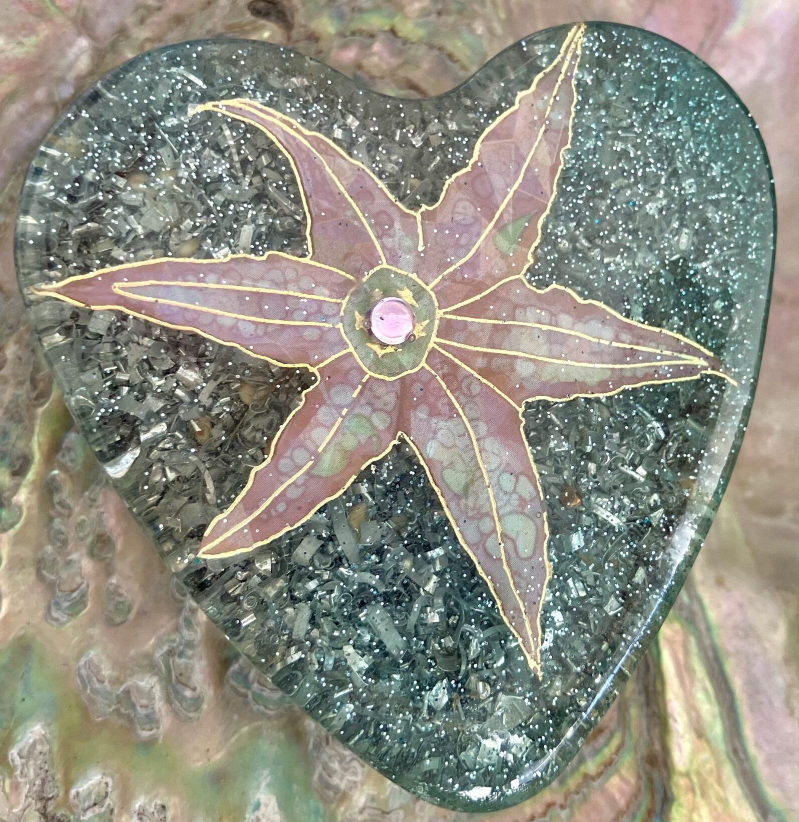 Divine Kauai Beautiful Orgonite Orgone hearts Divine Kauai Beautiful Orgonite Orgone hearts Beautiful Powerful Exquisite Orgonite Orgone Hearts are meticulously handcrafted with Hawaiian botanicals, Double-terminated crystals and lovely gemstones: Amethyst, Rose Quartz, Lapis Lazuli, Peridot, Aquamarine, Malachite and Howlite. Dr. Wilhelm Reich 50/50 ratio of resin to metal making it powerful orgonite. Orgonite transmutes the electromagnetic vibrations of modern technology into a frequency compatible with human well-being. Orgonite assists in balancing all of our bodies and fields to bring us into natural states of harmony and re-establishing energy flow in our body meridian system. Orgone, Orgonite for children, kids, gifts, Valentine's day, mother's day, father's day, birthdays, holidays, baby gifts, pets, all occasion. Orgonite devices transform the environment into a life-affirming atmosphere. transmutes EMR and ELF radiation from microwaves, Smart meters, computers, hand-held devices, Wi-Fi, Bluetooth, etc. Orgonite works perpetually & functions as a self-generating transmutation device. It never expires! Orgonite Orgone jewelry, necklaces, amulets. Meditation. Orgonites Orgone Orgonite cell phone shields. Orgone Orgonite Orgone Tablet shields. Orgonite Orgone monitor shields. Orgonite Orgone meditation. wifi protection Orgonite Orgone. Orgonite Orgone for sleep, healing, relaxation. Orgonite Orgone microwave shields. Orgonite Orgone appliance shields.