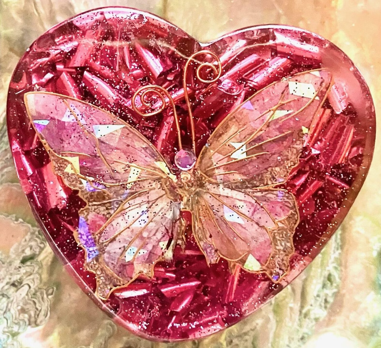 Beautiful Powerful Exquisite Orgonite Orgone Hearts are meticulously handcrafted with Hawaiian botanicals, Double-terminated crystals and lovely gemstones: Amethyst, Rose Quartz, Lapis Lazuli, Peridot, Aquamarine, Malachite and Howlite. Dr. Wilhelm Reich 50/50 ratio of resin to metal making it powerful orgonite. Orgonite transmutes the electromagnetic vibrations of modern technology into a frequency compatible with human well-being. Orgonite assists in balancing all of our bodies and fields to bring us into natural states of harmony and re-establishing energy flow in our body meridian system. Orgone, Orgonite for children, kids, gifts, Valentine's day, mother's day, father's day, birthdays, holidays, baby gifts, pets, all occasion. Orgonite devices transform the environment into a life-affirming atmosphere. transmutes EMR and ELF radiation from microwaves, Smart meters, computers, hand-held devices, Wi-Fi, Bluetooth, etc. Orgonite works perpetually & functions as a self-generating transmutation device. It never expires! Orgonite Orgone jewelry, necklaces, amulets. Meditation. Orgonites Orgone Orgonite cell phone shields. Orgone Orgonite Orgone Tablet shields. Orgonite Orgone monitor shields. Orgonite Orgone meditation. wifi protection Orgonite Orgone. Orgonite Orgone for sleep, healing, relaxation. Orgonite Orgone microwave shields. Orgonite Orgone appliance shields.