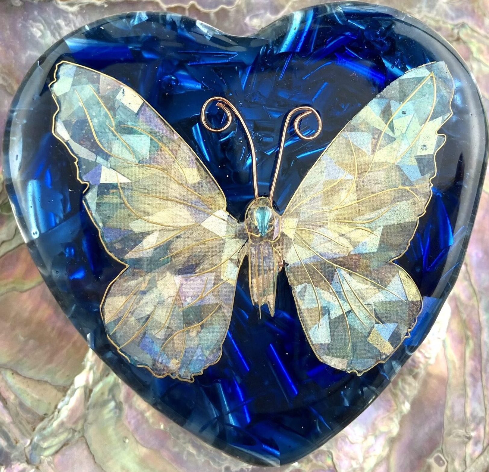 Beautiful Powerful Exquisite Orgonite Orgone Hearts are meticulously handcrafted with Hawaiian botanicals, Double-terminated crystals and lovely gemstones: Amethyst, Rose Quartz, Lapis Lazuli, Peridot, Aquamarine, Malachite and Howlite. Dr. Wilhelm Reich 50/50 ratio of resin to metal making it powerful orgonite. Orgonite transmutes the electromagnetic vibrations of modern technology into a frequency compatible with human well-being. Orgonite assists in balancing all of our bodies and fields to bring us into natural states of harmony and re-establishing energy flow in our body meridian system. Orgone, Orgonite for children, kids, gifts, Valentine's day, mother's day, father's day, birthdays, holidays, baby gifts, pets, all occasion. Orgonite devices transform the environment into a life-affirming atmosphere. transmutes EMR and ELF radiation from microwaves, Smart meters, computers, hand-held devices, Wi-Fi, Bluetooth, etc. Orgonite works perpetually & functions as a self-generating transmutation device. It never expires! Orgonite Orgone jewelry, necklaces, amulets. Meditation. Orgonites Orgone Orgonite cell phone shields. Orgone Orgonite Orgone Tablet shields. Orgonite Orgone monitor shields. Orgonite Orgone meditation. wifi protection Orgonite Orgone. Orgonite Orgone for sleep, healing, relaxation. Orgonite Orgone microwave shields. Orgonite Orgone appliance shields.