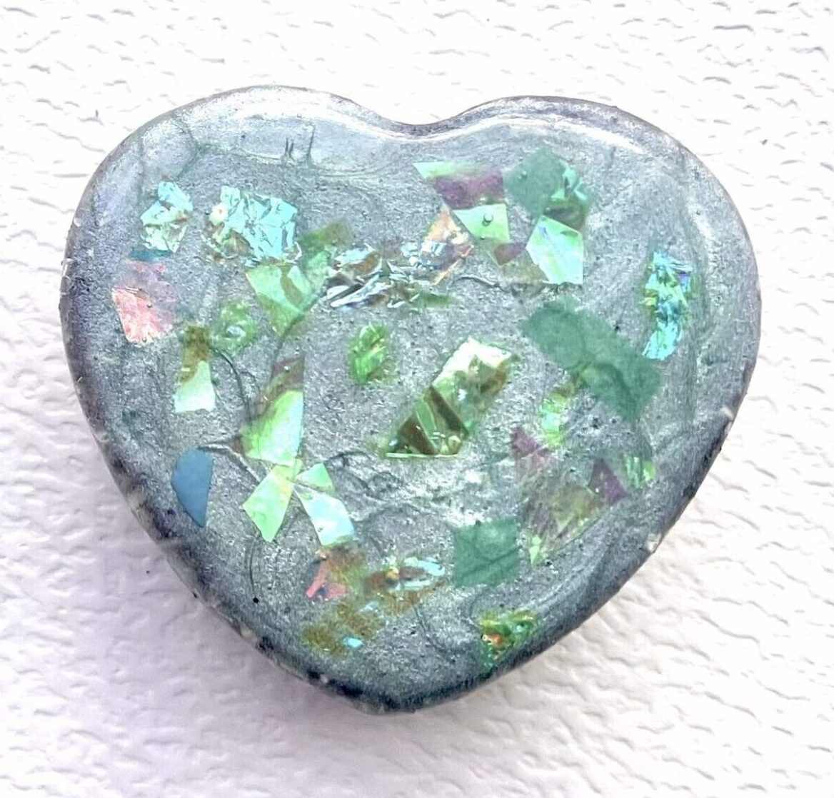 Beautiful Powerful Exquisite Orgonite Orgone Hearts are meticulously handcrafted with Hawaiian botanicals, Double-terminated crystals and lovely gemstones: Amethyst, Rose Quartz, Lapis Lazuli, Peridot, Aquamarine, Malachite and Howlite. Dr. Wilhelm Reich 50/50 ratio of resin to metal making it powerful orgonite. Orgonite transmutes the electromagnetic vibrations of modern technology into a frequency compatible with human well-being. Orgonite assists in balancing all of our bodies and fields to bring us into natural states of harmony and re-establishing energy flow in our body meridian system. Orgone, Orgonite for children, kids, gifts, Valentine's day, mother's day, father's day, birthdays, holidays, baby gifts, pets, all occasion. Orgonite devices transform the environment into a life-affirming atmosphere. transmutes EMR and ELF radiation from microwaves, Smart meters, computers, hand-held devices, Wi-Fi, Bluetooth, etc. Orgonite works perpetually & functions as a self-generating transmutation device. It never expires! Orgonite Orgone jewelry, necklaces, amulets. Meditation. Orgonites Orgone Orgonite cell phone shields. Orgone Orgonite Orgone Tablet shields. Orgonite Orgone monitor shields. Orgonite Orgone meditation. wifi protection Orgonite Orgone. Orgonite Orgone for sleep, healing, relaxation. Orgonite Orgone microwave shields. Orgonite Orgone appliance shields.