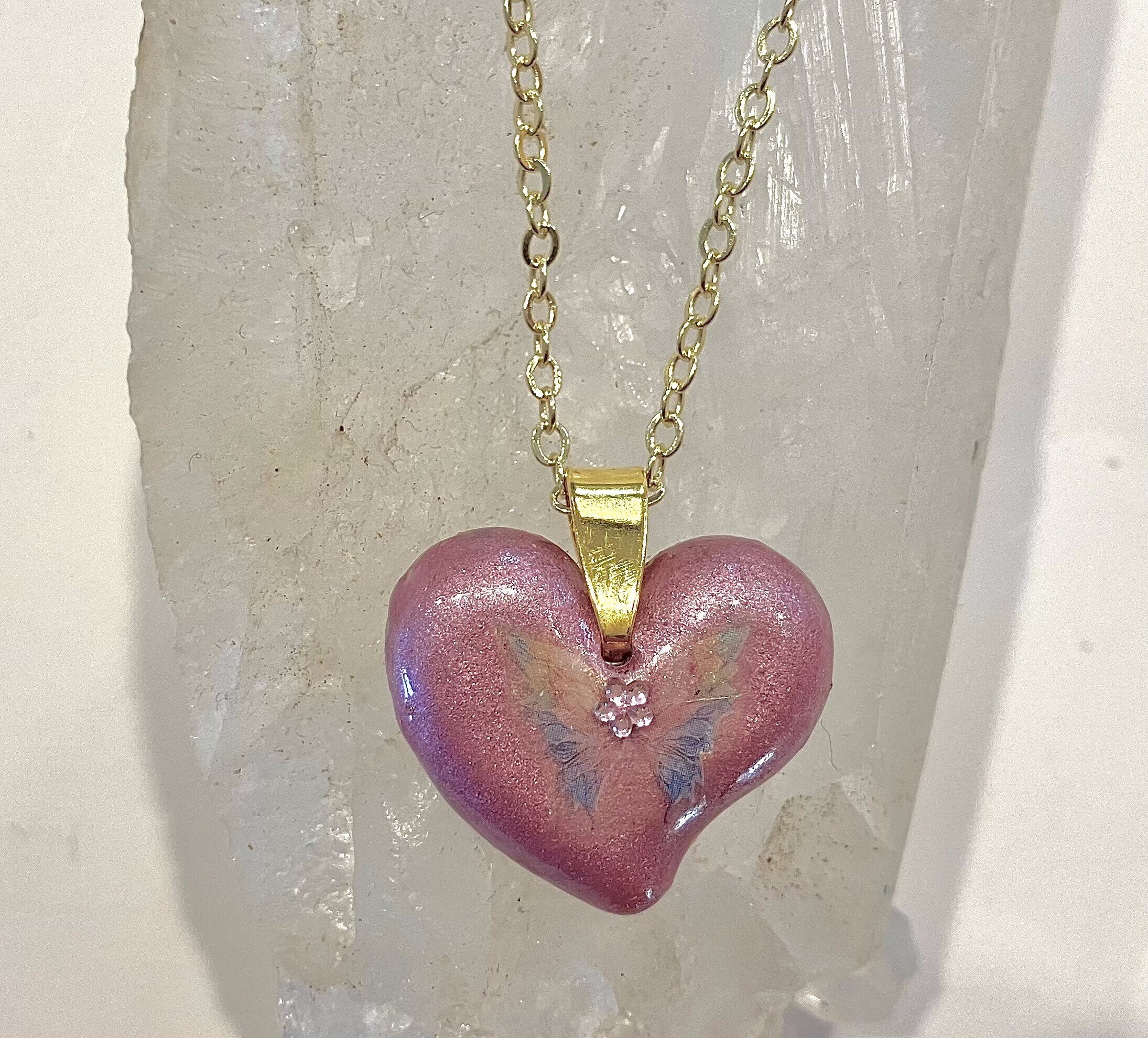 Beautiful Powerful Exquisite Orgonite Orgone Hearts are meticulously handcrafted with Hawaiian botanicals, Double-terminated crystals and lovely gemstones: Amethyst, Rose Quartz, Lapis Lazuli, Peridot, Aquamarine, Malachite and Howlite. Dr. Wilhelm Reich 50/50 ratio of resin to metal making it powerful orgonite. Orgonite transmutes the electromagnetic vibrations of modern technology into a frequency compatible with human well-being. Orgonite assists in balancing all of our bodies and fields to bring us into natural states of harmony and re-establishing energy flow in our body meridian system. Orgone, Orgonite for children, kids, gifts, Valentine's day, mother's day, father's day, birthdays, holidays, baby gifts, pets, all occasion. Orgonite devices transform the environment into a life-affirming atmosphere. transmutes EMR and ELF radiation from microwaves, Smart meters, computers, hand-held devices, Wi-Fi, Bluetooth, etc. Orgonite works perpetually & functions as a self-generating transmutation device. It never expires! Orgonite Orgone jewelry, necklaces, amulets. Meditation. Orgonites Orgone Orgonite cell phone shields. Orgone Orgonite Orgone Tablet shields. Orgonite Orgone monitor shields. Orgonite Orgone meditation. wifi protection Orgonite Orgone. Orgonite Orgone for sleep, healing, relaxation. Orgonite Orgone microwave shields. Orgonite Orgone appliance shields.