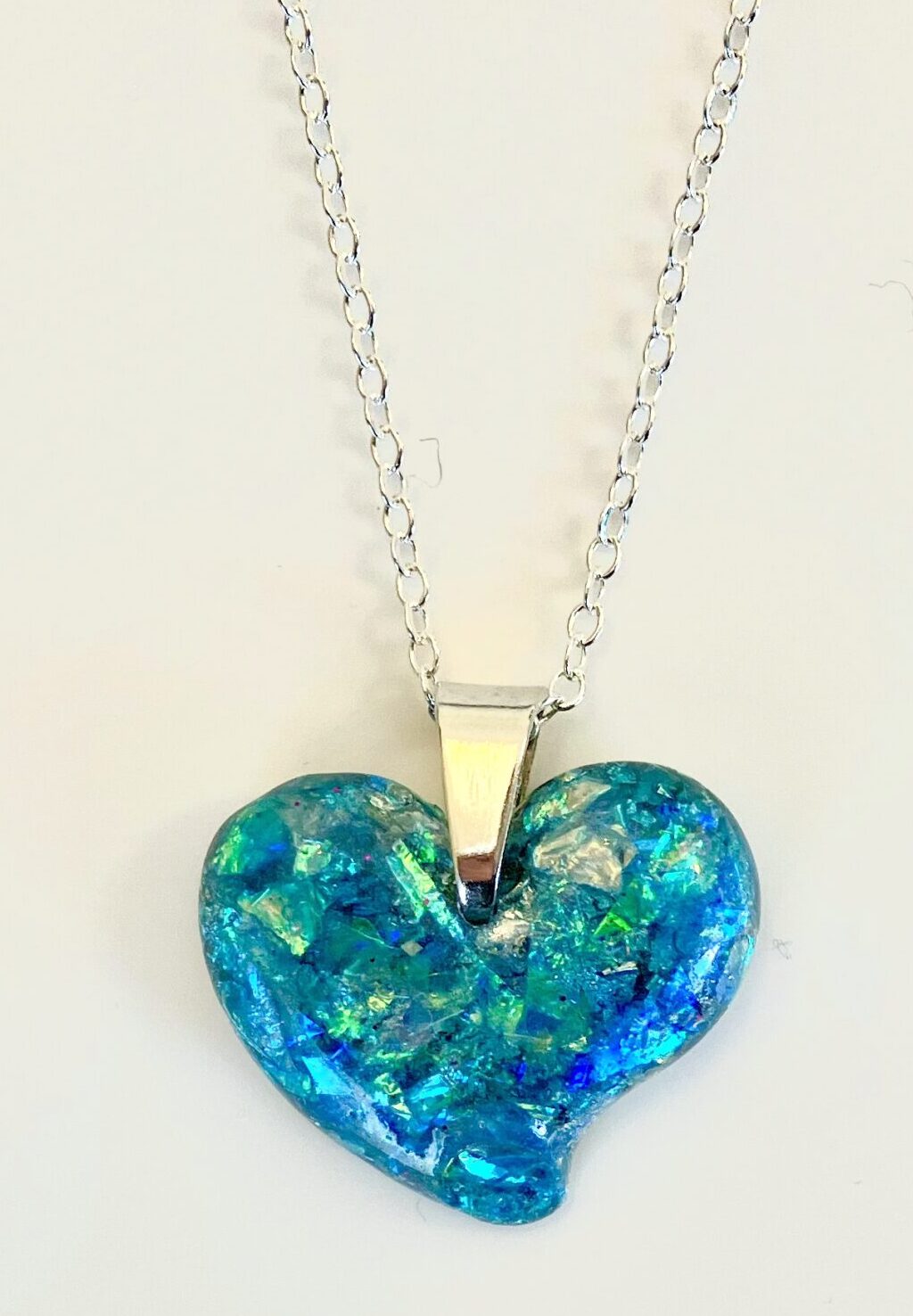 Beautiful Powerful Exquisite Orgonite Orgone jewelry, amulets, necklaces are meticulously handcrafted with Hawaiian botanicals, Double-terminated crystals and lovely gemstones: Amethyst, Rose Quartz, Lapis Lazuli, Peridot, Aquamarine, Malachite and Howlite. Dr. Wilhelm Reich 50/50 ratio of resin to metal making it powerful orgonite. Orgonite transmutes the electromagnetic vibrations of modern technology into a frequency compatible with human well-being. Orgonite assists in balancing all of our bodies and fields to bring us into natural states of harmony and re-establishing energy flow in our body meridian system. Orgone, Orgonite for children, kids, gifts, Valentine's day, mother's day, father's day, birthdays, holidays, baby gifts, pets, all occasion. Orgonite devices transform the environment into a life-affirming atmosphere. transmutes EMR and ELF radiation from microwaves, Smart meters, computers, hand-held devices, Wi-Fi, Bluetooth, etc. Orgonite works perpetually & functions as a self-generating transmutation device. It never expires! Orgonite Orgone jewelry, necklaces, amulets. Meditation. Orgonites Orgone Orgonite cell phone shields. Orgone Orgonite Orgone Tablet shields. Orgonite Orgone monitor shields. Orgonite Orgone meditation. wifi protection Orgonite Orgone. Orgonite Orgone for sleep, healing, relaxation. Orgonite Orgone microwave shields. Orgonite Orgone appliance shields.