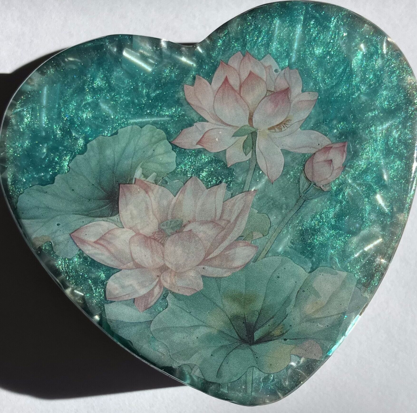 Beautiful Powerful Exquisite Orgonite Orgone Hearts are meticulously handcrafted with Hawaiian botanicals, Double-terminated crystals and lovely gemstones: Amethyst, Rose Quartz, Lapis Lazuli, Peridot, Aquamarine, Malachite and Howlite. Dr. Wilhelm Reich 50/50 ratio of resin to metal making it powerful orgonite. Orgonite transmutes the electromagnetic vibrations of modern technology into a frequency compatible with human well-being. Orgonite assists in balancing all of our bodies and fields to bring us into natural states of harmony and re-establishing energy flow in our body meridian system. Orgone, Orgonite for children, kids, gifts, Valentine's day, mother's day, father's day, birthdays, holidays, baby gifts, pets, all occasion. Orgonite devices transform the environment into a life-affirming atmosphere. transmutes EMR and ELF radiation from microwaves, Smart meters, computers, hand-held devices, Wi-Fi, Bluetooth, etc. Orgonite works perpetually & functions as a self-generating transmutation device. It never expires! Orgonite Orgone Orgonites Orgone Orgonite Orgone Orgonite Orgone Orgonite Orgone Orgonite Orgone Orgonite Orgone Orgonite Orgone