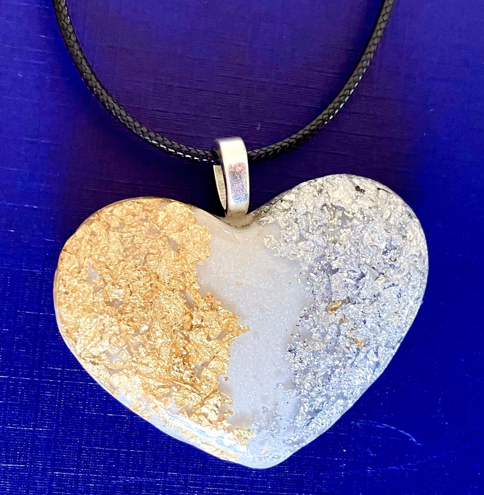 Beautiful Powerful Exquisite Orgonite Orgone jewelry, amulets, necklaces are meticulously handcrafted with Hawaiian botanicals, Double-terminated crystals and lovely gemstones: Amethyst, Rose Quartz, Lapis Lazuli, Peridot, Aquamarine, Malachite and Howlite. Dr. Wilhelm Reich 50/50 ratio of resin to metal making it powerful orgonite. Orgonite transmutes the electromagnetic vibrations of modern technology into a frequency compatible with human well-being. Orgonite assists in balancing all of our bodies and fields to bring us into natural states of harmony and re-establishing energy flow in our body meridian system. Orgone, Orgonite for children, kids, gifts, Valentine's day, mother's day, father's day, birthdays, holidays, baby gifts, pets, all occasion. Orgonite devices transform the environment into a life-affirming atmosphere. transmutes EMR and ELF radiation from microwaves, Smart meters, computers, hand-held devices, Wi-Fi, Bluetooth, etc. Orgonite works perpetually & functions as a self-generating transmutation device. It never expires! Orgonite Orgone jewelry, necklaces, amulets. Meditation. Orgonites Orgone Orgonite cell phone shields. Orgone Orgonite Orgone Tablet shields. Orgonite Orgone monitor shields. Orgonite Orgone meditation. wifi protection Orgonite Orgone. Orgonite Orgone for sleep, healing, relaxation. Orgonite Orgone microwave shields. Orgonite Orgone appliance shields.